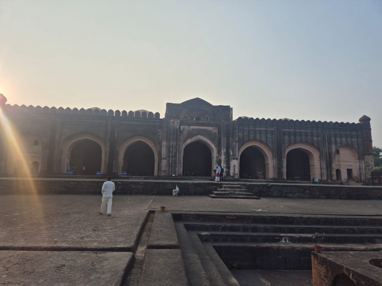 Ancient Mughal era mosque architecture with arches and domes representing Jami Masjid Rajmahal